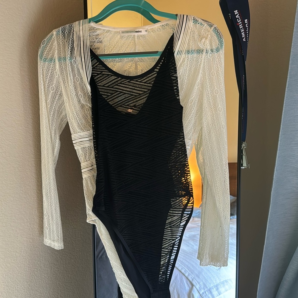 Two bodysuits one white one black
